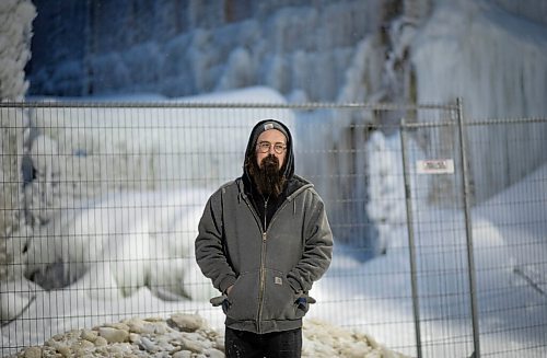 JESSICA LEE / WINNIPEG FREE PRESS

Chris Sawatzky, a guitarist who rented a practice space in the basement of the Kirkwood block, poses for a photo on February 9, 2022. The building is covered with ice from the water the firefighters used to put out the fire on February 2, 2022.

Reporter: Ben







