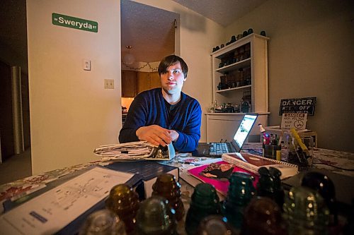 MIKAELA MACKENZIE / WINNIPEG FREE PRESS

Chris Sweryda, who has compiled information on hundreds of Winnipeg intersections, poses for a portrait in his home in Winnipeg on Wednesday, Feb. 9, 2022. For Ryan Thorpe story.
Winnipeg Free Press 2022.