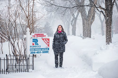 MIKAELA MACKENZIE / WINNIPEG FREE PRESS

Renée Robidoux Kapitoler, real estate agent, poses for a portrait in front of a house that will be coming on the market soon in Winnipeg on Thursday, Feb. 10, 2022. Shes never seen the housing market as crazy in January/February than this year (and maybe last). For Gabby Piche story.
Winnipeg Free Press 2022.