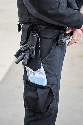 David Lipnowski / Winnipeg Free Press

CF Polo Park Mall security guards had masks in their pockets in preparation for protesters refusing to  wear the required face mask Saturday February 12, 2022.