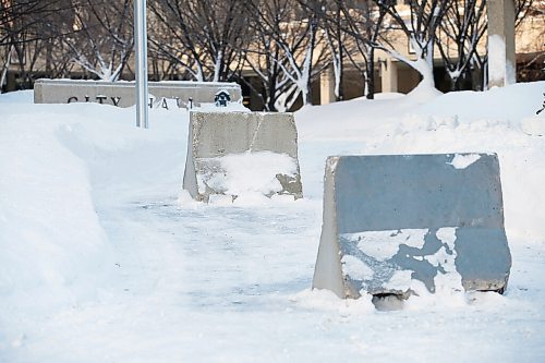 JOHN WOODS / WINNIPEG FREE PRESS
Some cement barriers have been installed on sidewalks at city hall, Monday, February 14, 2022. 

Re: ?