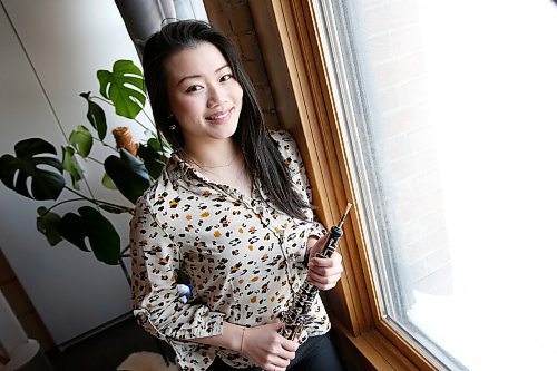 JOHN WOODS / WINNIPEG FREE PRESS
WSO principal oboist Beverly Wang is photographed in her Exchange apartment, Monday, February 14, 2022. Wang will be the featured soloist in the upcoming concert February 19th.

Re: Harris