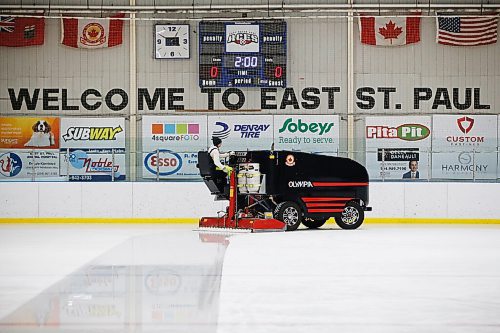 JOHN WOODS / WINNIPEG FREE PRESS
Taylor Brandt, recreation facility operator at East St Paul Community Centre, resurfaces the indoor rink at the community centre Monday, February 14, 2022. Brandt has been driving an ice resurfacer for the past year. Brandt also does landscaping at the centre during the summer months.

Re: Small
