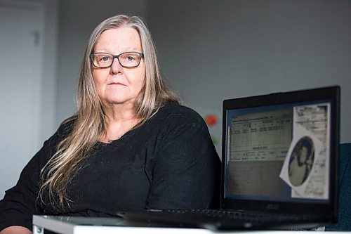 MIKAELA MACKENZIE / WINNIPEG FREE PRESS

Dr. Anne Lindsay, who does archival research in support of locating burial sites of missing Indigenous patients who never returned from Manitoba Tuberculosis Hospitals, poses for a portrait in her home in Winnipeg on Tuesday, Feb. 15, 2022. For Cody Sellar story.
Winnipeg Free Press 2022.