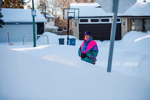 MIKAELA MACKENZIE / WINNIPEG FREE PRESS

Rosella McLean, who got into an accident two years ago because of high snowbanks at street entrance of Margaret Grant Pool, poses for a portrait behind high snowbanks near her house in Winnipeg on Wednesday, Feb. 16, 2022. For Kevin Rollason story.
Winnipeg Free Press 2022.