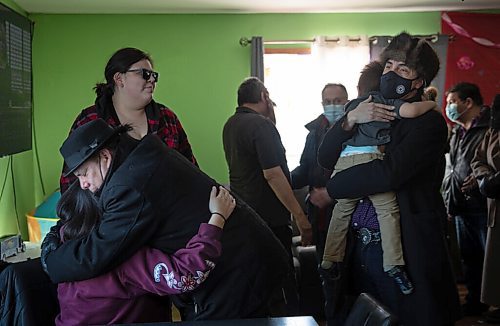 JESSICA LEE / WINNIPEG FREE PRESS

MKO Grand Chief Garrison Settee, who is from Pimicikamak Cree Nation, (right) and Grand Chief Arlen Dumas hug relatives of the North family at the grandfathers house of the North children on February 16, 2022 at Cross Lake. A fire occurred on February 12, 2022 at the North residence and took the lives of three children: Kolby North, 17, Jade North, 13 and Reid North, 3.

Reporter: Danielle