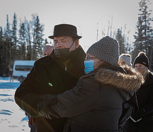 JESSICA LEE / WINNIPEG FREE PRESS

MKO Grand Chief Garrison Settee, who is from Pimicikamak Cree Nation, hugs a relative of the family affected at the site of where a house formerly was on February 16, 2022 at Cross Lake. A fire occurred on February 12, 2022 and took the lives of three children: Kolby North, 17, Jade North, 13 and Reid North, 3.

Reporter: Danielle