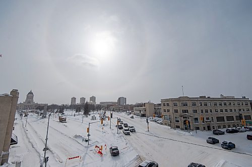 Mike Sudoma / Winnipeg Free Press
A sun dog hangs in the sky above the intersection of Memorial Boulevard and St Mary Avenue Friday afternoon
February 18, 2022