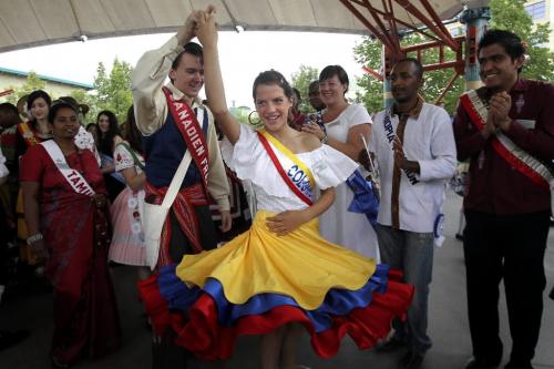 MIKE.DEAL@FREEPRESS.MB.CA 100722 - Thursday, July 22, 2010 -  Youth Ambassadors Miguel Marchildon (French Canadian) and Nicole Muchow (Columbia) dance after the official launch of Folklorama at The Forks.  MIKE DEAL / WINNIPEG FREE PRESS
