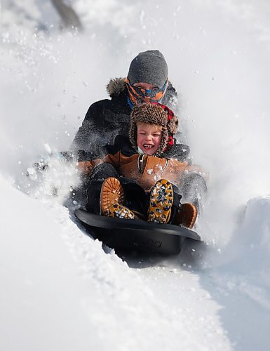 JOHN WOODS / WINNIPEG FREE PRESS
Marc Therrien and son Liam, 6, were out enjoying the new powder sledding at Fort Whyte, Sunday, February 20, 2022. Winnipeg and surrounding area received another dump of snow yesterday.

Re: standup