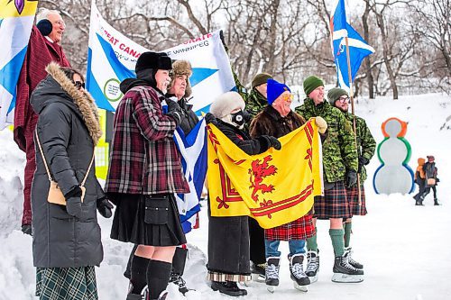 MIKAELA MACKENZIE / WINNIPEG FREE PRESS

Folks pose for a group photo at the Great Canadian Kilt Skate, put on by the St. Andrews Society of Winnipeg, at The Forks in Winnipeg on Monday, Feb. 21, 2022. Last year Winnipeg won the national title as kilt skate capital of Canada. Standup.
Winnipeg Free Press 2022.