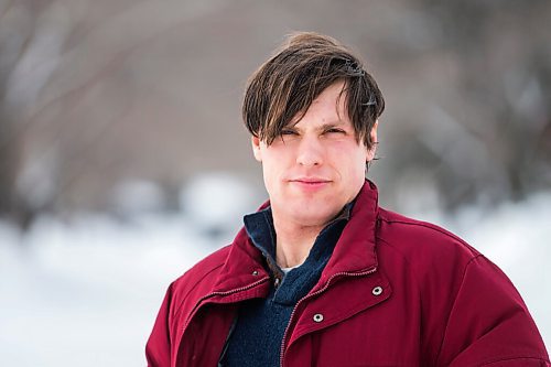 MIKAELA MACKENZIE / WINNIPEG FREE PRESS

Independent researcher Chris Sweryda poses for a portrait on Henderson Highway near Springfield Road, where a school zone sign is missing, in Winnipeg on Monday, Feb. 21, 2022. For Ryan Thorpe story.
Winnipeg Free Press 2022.