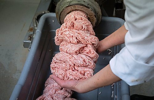 JESSICA LEE / WINNIPEG FREE PRESS

Michelle Mansell, owner, grinds pork at Frigs Natural Meats on February 22, 2022.

Reporter: Dave
