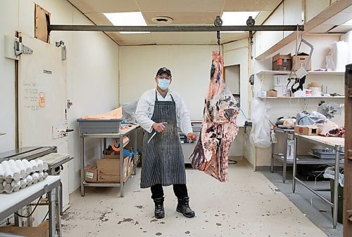 JESSICA LEE / WINNIPEG FREE PRESS

Archito Quisumbing, a butcher at Frigs, poses for a photograph at Frigs Natural Meats on February 22, 2022.

Reporter: Dave
