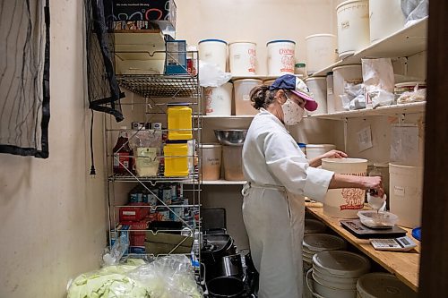 JESSICA LEE / WINNIPEG FREE PRESS

Michelle Mansell, owner, measures spices at Frigs Natural Meats to make sausages on February 22, 2022.

Reporter: Dave