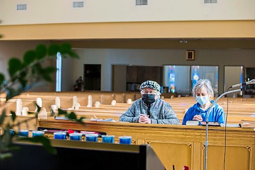 MIKAELA MACKENZIE / WINNIPEG FREE PRESS

Mother and daughter parishioners Rose (left) and Diana Olynyk pray for the Ukraine at St. Basil's Ukrainian Catholic Church in Winnipeg on Thursday, Feb. 24, 2022. For Erik story.
Winnipeg Free Press 2022.