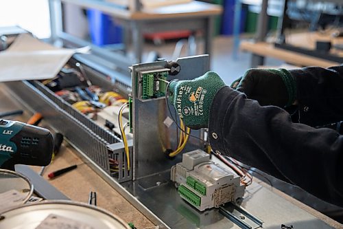 JESSICA LEE / WINNIPEG FREE PRESS

Ed Salonga is photographed wiring a control panel at Conviron on February 24, 2022.

Reporter: Martin
