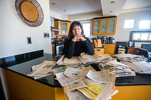 MIKAELA MACKENZIE / WINNIPEG FREE PRESS

Enid Barnes, longtime contributor and avid reader of the papers Recipe Swap column, poses for a portrait in her kitchen with her collection of recipe clippings in Winnipeg on Friday, Feb. 25, 2022. For Eva Wasney story.
Winnipeg Free Press 2022.