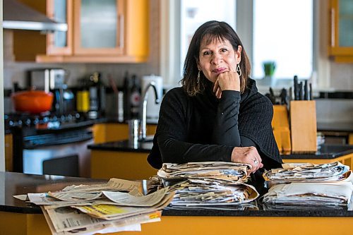 MIKAELA MACKENZIE / WINNIPEG FREE PRESS

Enid Barnes, longtime contributor and avid reader of the papers Recipe Swap column, poses for a portrait in her kitchen with her collection of recipe clippings in Winnipeg on Friday, Feb. 25, 2022. For Eva Wasney story.
Winnipeg Free Press 2022.