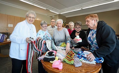 RUTH BONNEVILLE / WINNIPEG FREE PRESS

PHILANTHROPY

Group photo of Ann-Marie Sellers (centre white hair, grey sweater), founder of Community Helpers with her group of helpers that create handmade items for the needy.  



Story: For the Philanthropy Page. Community Helpers is a group created in 2015 with members from two adjoining apartment buildings in St. Vital. Members do everything from fundraisers, to food and water drives, growing fresh vegetables to give away, looming, crocheting and knitting hats and mats for those who need them. Theyve connected with numerous agencies in the city and made donations to Siloam Mission, the Bear Clan, Koats for Kids, Agape Table and many others.



 
Feb 25th, 2022