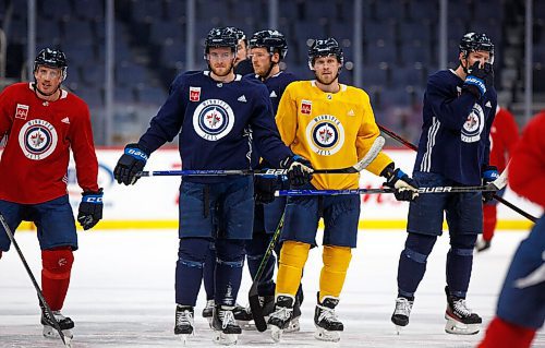 MIKE DEAL / WINNIPEG FREE PRESS
Winnipeg Jets' Andrew Copp (9) and Nikolaj Ehlers (27) during practice at Canada Life Centre Monday morning.
220228 - Monday, February 28, 2022.