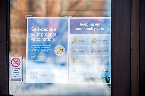 MIKAELA MACKENZIE / WINNIPEG FREE PRESS

Signs indicate masking and vaccination protocols on the doors of the University Centre at the University of Manitoba in Winnipeg on Monday, Feb. 28, 2022. For Maggie Macintosh story.
Winnipeg Free Press 2022.