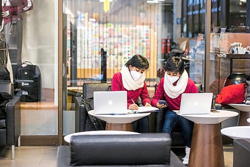 MIKAELA MACKENZIE / WINNIPEG FREE PRESS

Swapnil Kasafat (left) and Nirzhar Risalat, civil engineering students, study in the University Centre on campus at the University of Manitoba in Winnipeg on Monday, Feb. 28, 2022. For Maggie Macintosh story.
Winnipeg Free Press 2022.