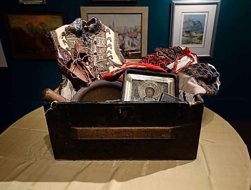 RUTH BONNEVILLE / WINNIPEG FREE PRESS

Local - Oseredok Ukrainian Cultural and Education Centre

Trunk from the 1890's brought to Winnipeg by Ukrainian immigrants coming from west UK.  Items in the trunk are typical items immigrants would have brought with them like: a prayer book, old photos. Framed Icon, dress shoes and clothes and cooking utensils.

Photos of artifacts, archive photos, art etc. at the Oseredok Ukrainian Cultural and Education Centre.  For story about the history of the Ukrainian connection to the Winnipeg.  
 
Feb 28th, 2022