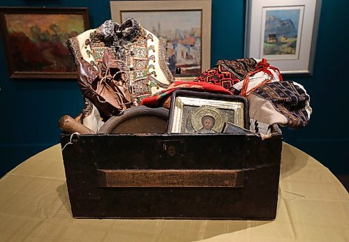 RUTH BONNEVILLE / WINNIPEG FREE PRESS

Local - Oseredok Ukrainian Cultural and Education Centre

Trunk from the 1890's brought to Winnipeg by Ukrainian immigrants coming from west UK.  Items in the trunk are typical items immigrants would have brought with them like: a prayer book, old photos. Framed Icon, dress shoes and clothes and cooking utensils.

Photos of artifacts, archive photos, art etc. at the Oseredok Ukrainian Cultural and Education Centre.  For story about the history of the Ukrainian connection to the Winnipeg.  
 
Feb 28th, 2022