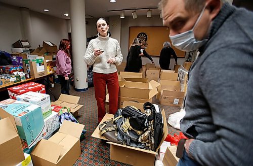 JOHN WOODS / WINNIPEG FREE PRESS
Anna Karpenko, centre, talks to a volunteer as they pack boxes of requested essentials at the Ukrainian National Federation Tuesday, March 1, 2022. Karpenko organized the donation drive and plans to ship the items to Ukraine.

Re: Piche