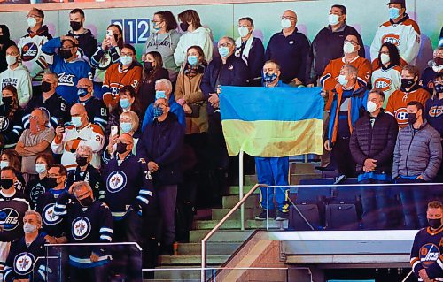 JOHN WOODS / WINNIPEG FREE PRESS
Fans listen to Hoosli Male Chorus sing the Ukraine and Canada anthems before the Winnipeg Jets and the Montreal Canadiens play in Winnipeg on Tuesday, March 1, 2021.