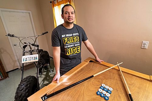 Daniel Crump / Winnipeg Free Press. Adonis Fernandez, 37, was born in the Philippines & moved to Winnipeg in 2011, joining his sisters. About three years ago he started selling his own line of Filipino-themed T-shirts, which he was selling at pop-ups. March 2, 2022.