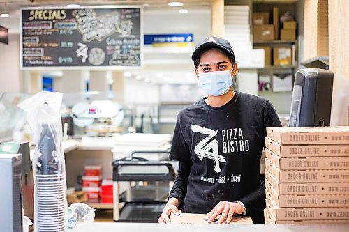 MIKAELA MACKENZIE / WINNIPEG FREE PRESS

Anmol Dhaliwal poses for a portrait at the CityPlace food court in Winnipeg on Thursday, March 3, 2022. For Chris Kitching story.
Winnipeg Free Press 2022.