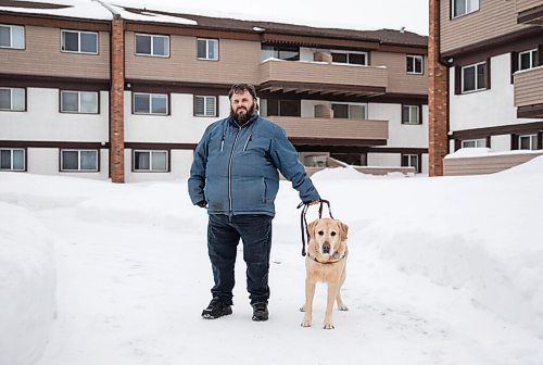 JESSICA LEE / WINNIPEG FREE PRESS

Brian Thorkelson poses for a photo with his service dog on March 4, 2022 outside his home. He is visually impaired and can see only light.

Reporter: Cody
