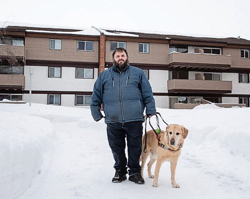 JESSICA LEE / WINNIPEG FREE PRESS

Brian Thorkelson poses for a photo with his service dog on March 4, 2022 outside his home. He is visually impaired and can see only light.

Reporter: Cody
