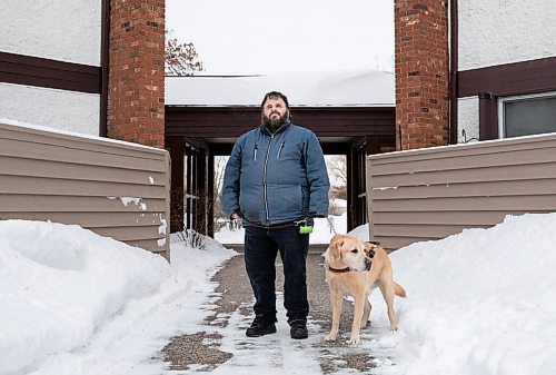 JESSICA LEE / WINNIPEG FREE PRESS

Brian Thorkelson poses for a photo with his service dog on March 4, 2022 outside his home. He is visually impaired and can see only light.

Reporter: Cody
