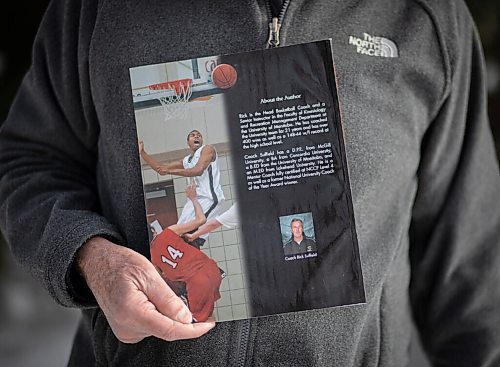 JESSICA LEE / WINNIPEG FREE PRESS

Former Gordon Bell basketball coach Rick Suffield holds a book he published about coaching outside his Winnipeg home on March 7, 2022.

Reporter: Mike S
