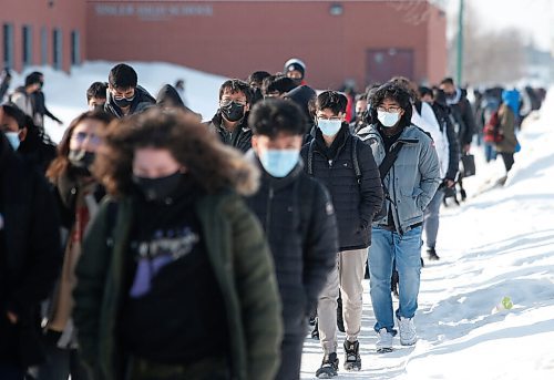 JOHN WOODS / WINNIPEG FREE PRESS
Outside Sisler High School students leave for the day, Monday, March 7, 2022. March 15th sees Manitobas COVID-19 mask protocols change and results in masks not being mandatory.