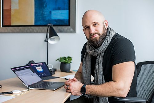 MIKAELA MACKENZIE / WINNIPEG FREE PRESS

Ryan Caligiuri, who was one of the first Manitobans to get covid, poses for a portrait in his office in Winnipeg on Tuesday, March 8, 2022. For Kevin story.
Winnipeg Free Press 2022.