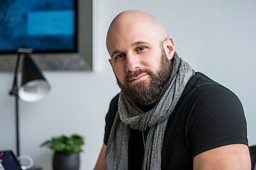 MIKAELA MACKENZIE / WINNIPEG FREE PRESS

Ryan Caligiuri, who was one of the first Manitobans to get covid, poses for a portrait in his office in Winnipeg on Tuesday, March 8, 2022. For Kevin story.
Winnipeg Free Press 2022.