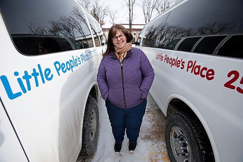 JOHN WOODS / WINNIPEG FREE PRESS
Carol Jones, executive director of Little Peoples Place Daycare, is photographed with her vandalized childcare vans Tuesday, March 8, 2022. The childcare staff discovered that the gas tanks of their three vehicles were drilled and drained.