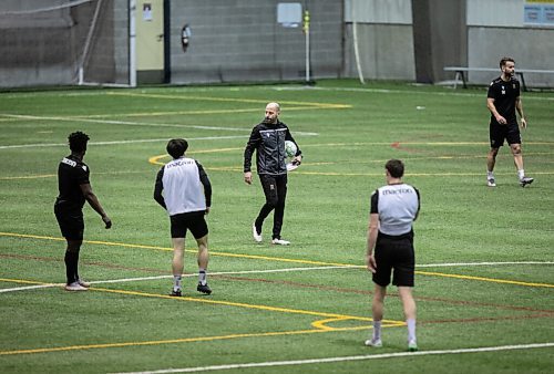 JESSICA LEE / WINNIPEG FREE PRESS

Coach Phillip Dos Santos (in jacket) is photographed during Valour FC soccer practice on March 8, 2022 at Winnipeg Soccer Federation South.

Reporter: Taylor



