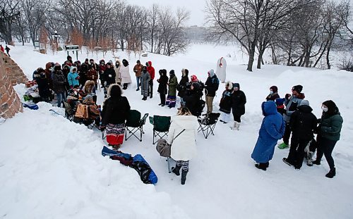 JOHN WOODS / WINNIPEG FREE PRESS
People gather for a Clan Mothers Healing Village walk to the MMIWG memorial statue at the Forks Tuesday, March 8, 2022. The group shared thoughts about Indigenous womens leadership and to remember those who are murdered and missing.