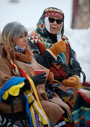 JOHN WOODS / WINNIPEG FREE PRESS
Elders Billie Schibler, left, and Mae Louise Campbell speak at a Clan Mothers Healing Village walk to the MMIWG memorial statue at the Forks Tuesday, March 8, 2022. The group shared thoughts about Indigenous womens leadership and to remember those who are murdered and missing.