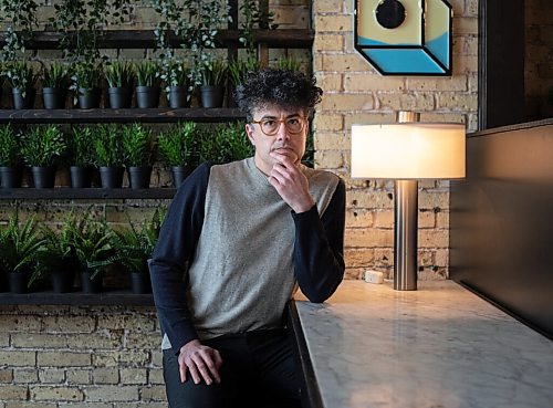 JESSICA LEE / WINNIPEG FREE PRESS

Filmmaker Damien Ferland poses for a portrait on March 8, 2022 at a cafe in the Exchange District.

Reporter: Randall


