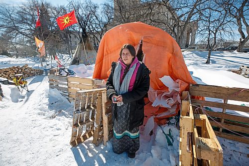MIKE DEAL / WINNIPEG FREE PRESS
Melahat Paul a fire keeper at the Sacred Fire camp on the east side of the Manitoba Legislative building shows where the security team destroyed their tents.
The people at the two peace camps that have been on the grounds of the Manitoba Legislative building were confronted by Provincial Security officers around 7 a.m. Wednesday morning. The officers had bulldozers with them and they dismantled structures on both camps only stopping when occupiers were forced to throw themselves in front of the heavy machinery.
One of the camps which has had a sacred fire burning for almost a year on the east side of the building had several of their tents destroyed including their kitchen which held donated foods for the fire keepers. The other camp in Memorial Park, which has been around since September, but grew larger during the convoy protest had a few structures bulldozed and removed.
See Codey Sellar story
220309 - Wednesday, March 09, 2022.