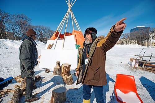 MIKE DEAL / WINNIPEG FREE PRESS
Medicine man, Jerome Desilets, talks about what structures were removed at the peace camp on Memorial Park.
The people at the two peace camps that have been on the grounds of the Manitoba Legislative building were confronted by Provincial Security officers around 7 a.m. Wednesday morning. The officers had bulldozers with them and they dismantled structures on both camps only stopping when occupiers were forced to throw themselves in front of the heavy machinery.
One of the camps which has had a sacred fire burning for almost a year on the east side of the building had several of their tents destroyed including their kitchen which held donated foods for the fire keepers. The other camp in Memorial Park, which has been around since September, but grew larger during the convoy protest had a few structures bulldozed and removed.
See Codey Sellar story
220309 - Wednesday, March 09, 2022.