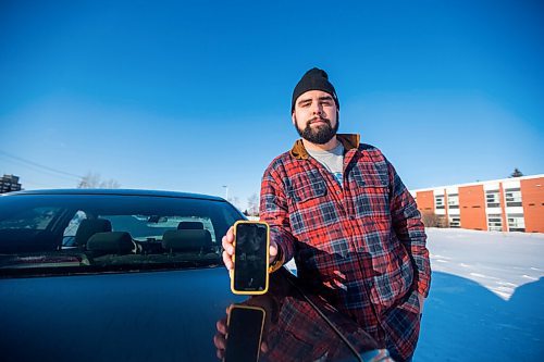 MIKAELA MACKENZIE / WINNIPEG FREE PRESS

Brett Parkin, who hasnt driven for SkipTheDishes for three weeks because of gas prices, poses for a portrait with his car in Winnipeg on Wednesday, March 9, 2022. For Gabby story.
Winnipeg Free Press 2022.