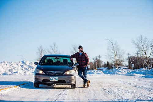 MIKAELA MACKENZIE / WINNIPEG FREE PRESS

Brett Parkin, who hasnt driven for SkipTheDishes for three weeks because of gas prices, poses for a portrait with his car in Winnipeg on Wednesday, March 9, 2022. For Gabby story.
Winnipeg Free Press 2022.