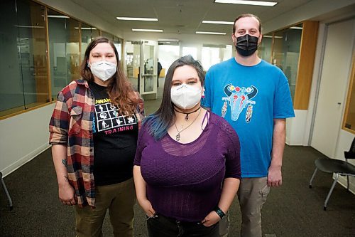 MIKE DEAL / WINNIPEG FREE PRESS
Graduates of the Fearless R2Ws community safety host program (from left), Landa Rispler, Julien Malik, and John Bur.
A graduation ceremony took place in the Millennium Library Friday morning.
The new Community Safety Host's have become certified security guards and have learned first aid, psychological first aid, harm reduction and how to become family advocates.
The safety hosts will do work placements in libraries in the North End and St. Boniface.
220311 - Friday, March 11, 2022.